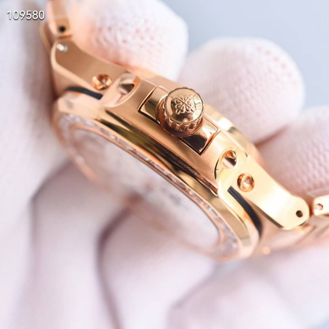 파텍필립 노틸러스 퍼페츄얼 캘린더 바게트다이아 18k 도금 자개 컬러 시계 워치